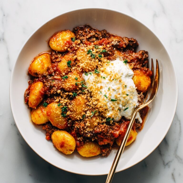 Millionaire Gnocchi with Red Sauce, Herbed Ricotta, and Golden Crispies Recipe