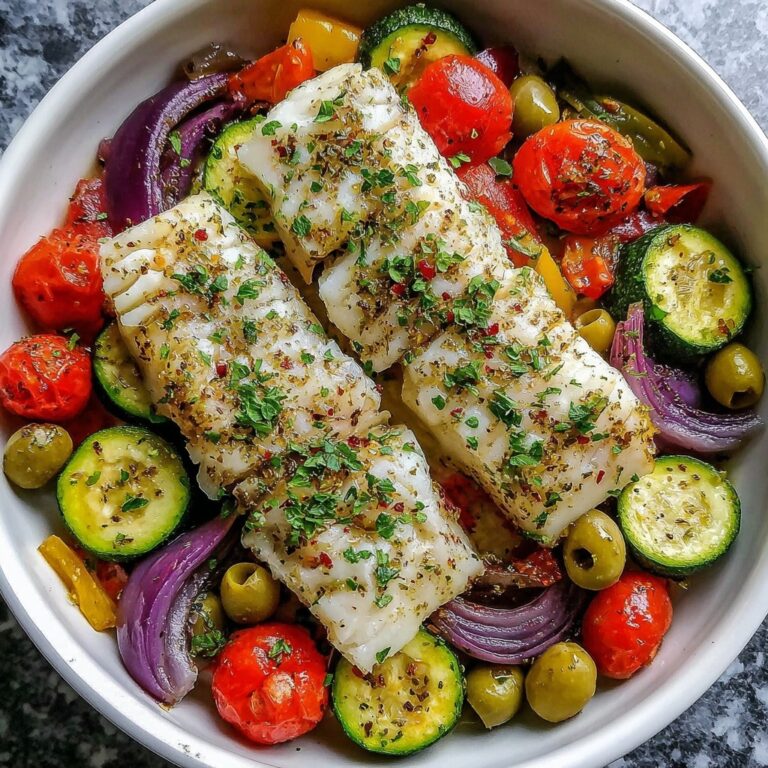 Mediterranean Baked Fish with Cherry Tomatoes, Olives, and Herbs Recipe