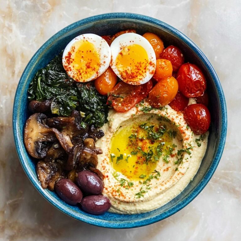 Savory Breakfast Bowls with Mushrooms, Cherry Tomatoes, Spinach, and Hummus Recipe